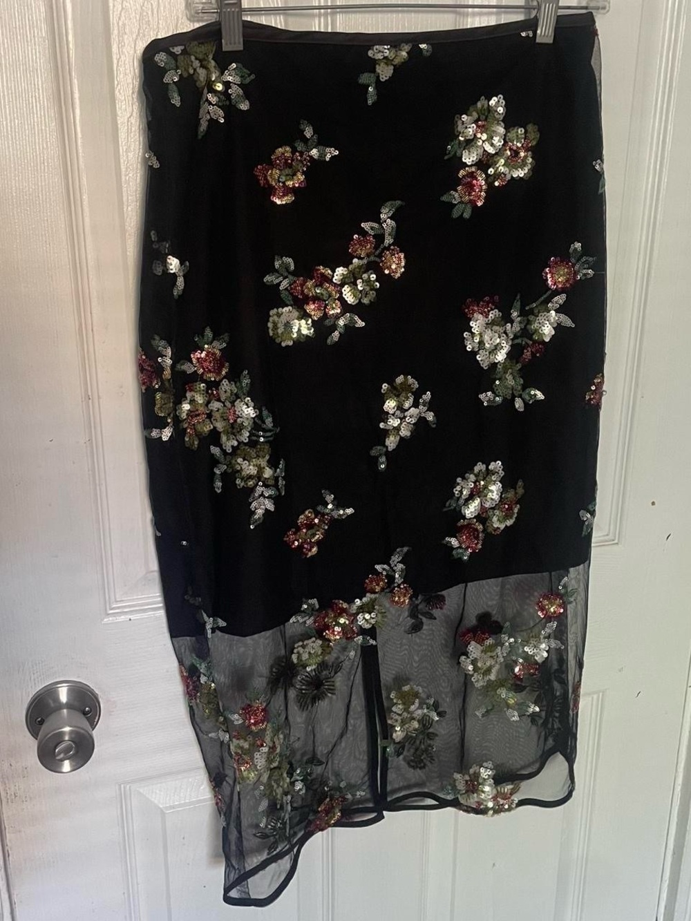 Black midi skirt with floral sequins